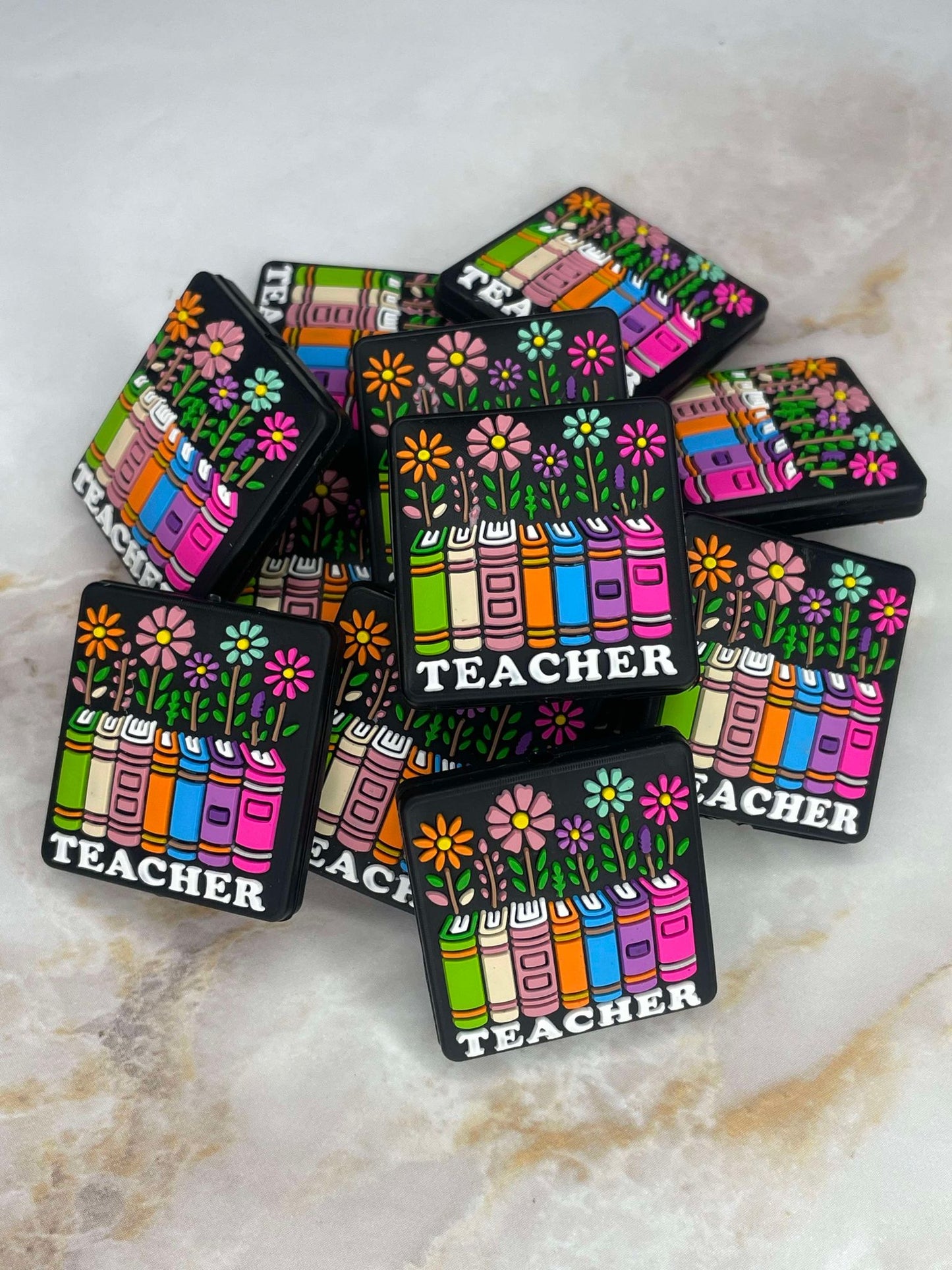 FLORAL BOOKSTACK TEACHER SILICONE FOCAL